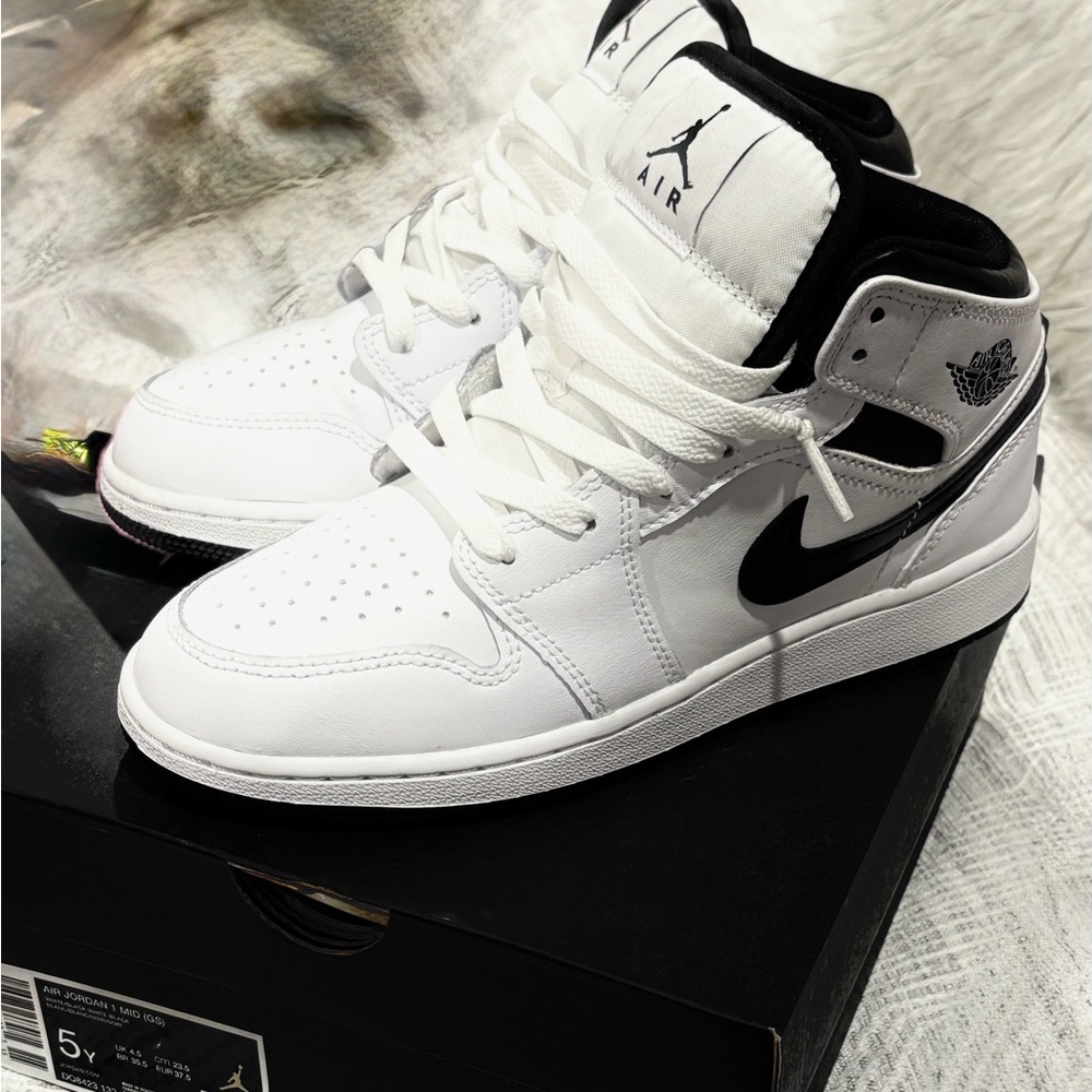 White and Black Air Jordan 1 Sneakers